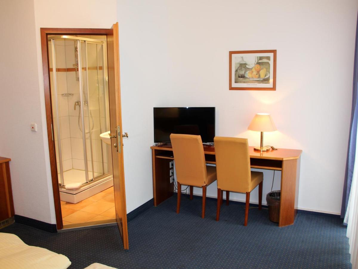 City Hotel Stuttgart Rum bild